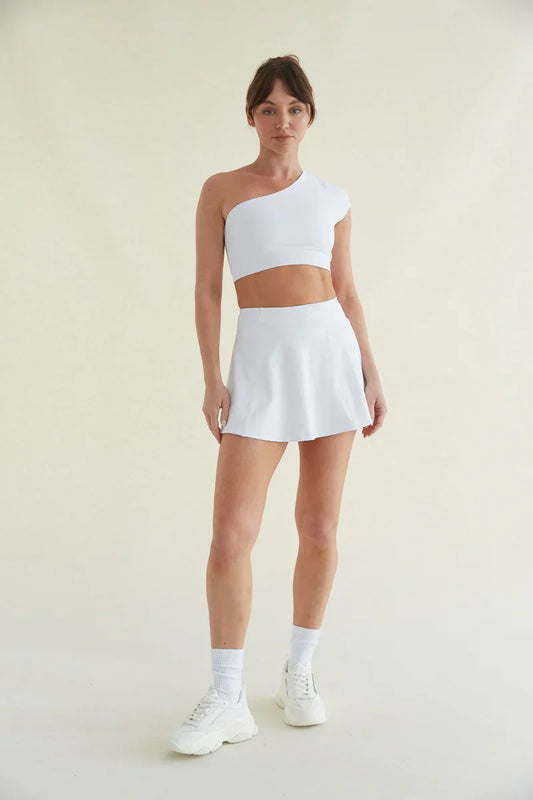 Avery Smoothing Flare Tennis Skort in White